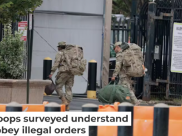 National Guard members arrive at the Guard’s headquarters at D.C. Armory on Aug. 12, 2025 in Washington. Anna Moneymaker/Getty Images